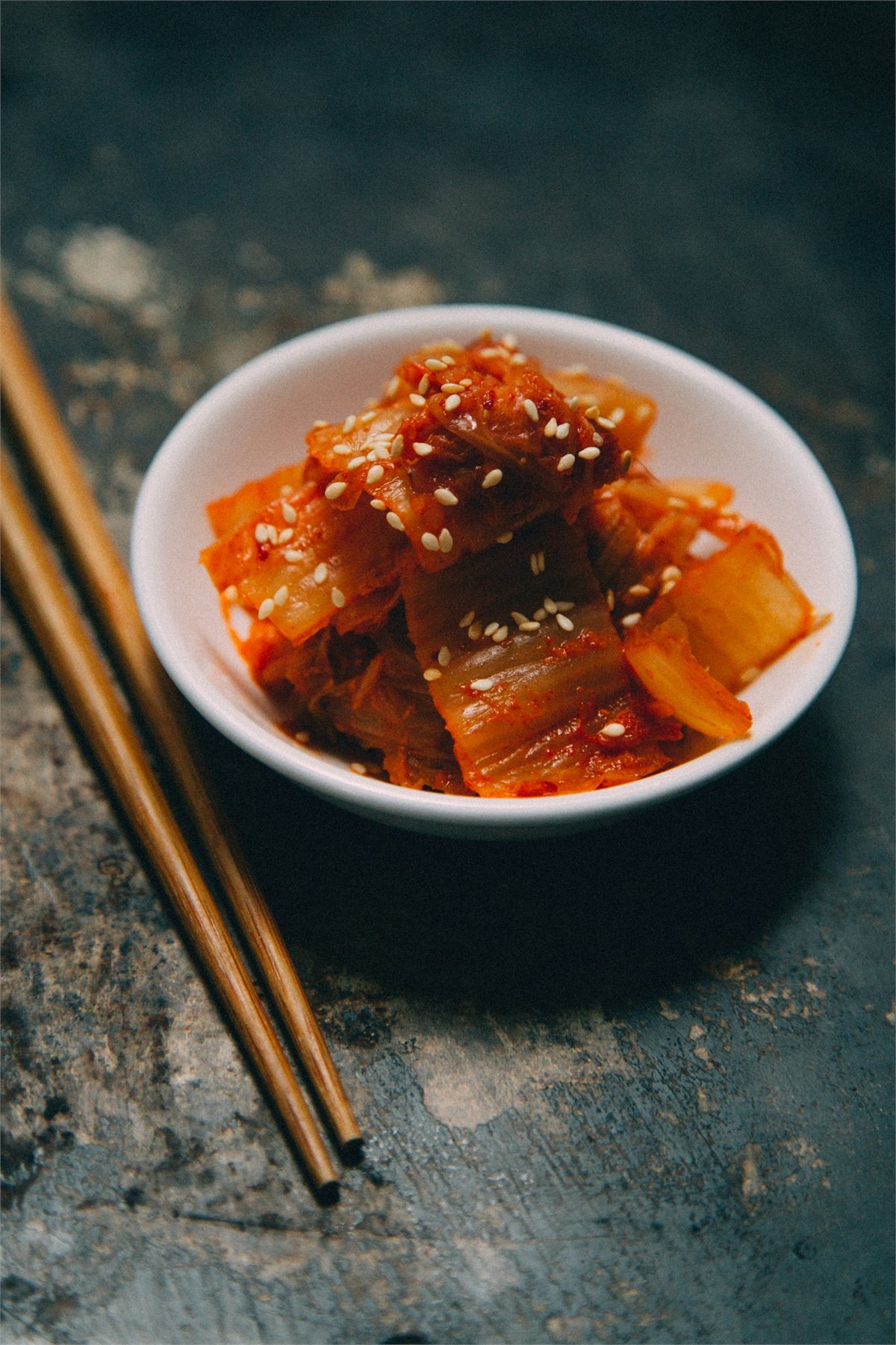 Napa cabbage kimchi topped with sesame seeds